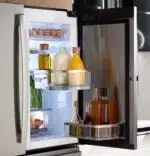 GE Profile™ Series ENERGY STAR® 28.4 Cu. Ft. Quad-Door Refrigerator with Dual-Dispense AutoFill Pitcher and Door in Door Model #:PAD28BYTFS - Image 5